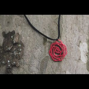 18” faux black leather cord with rose